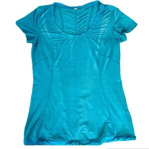 Lululemon women's Adjustable waist breathable Teal shirt / Size 6